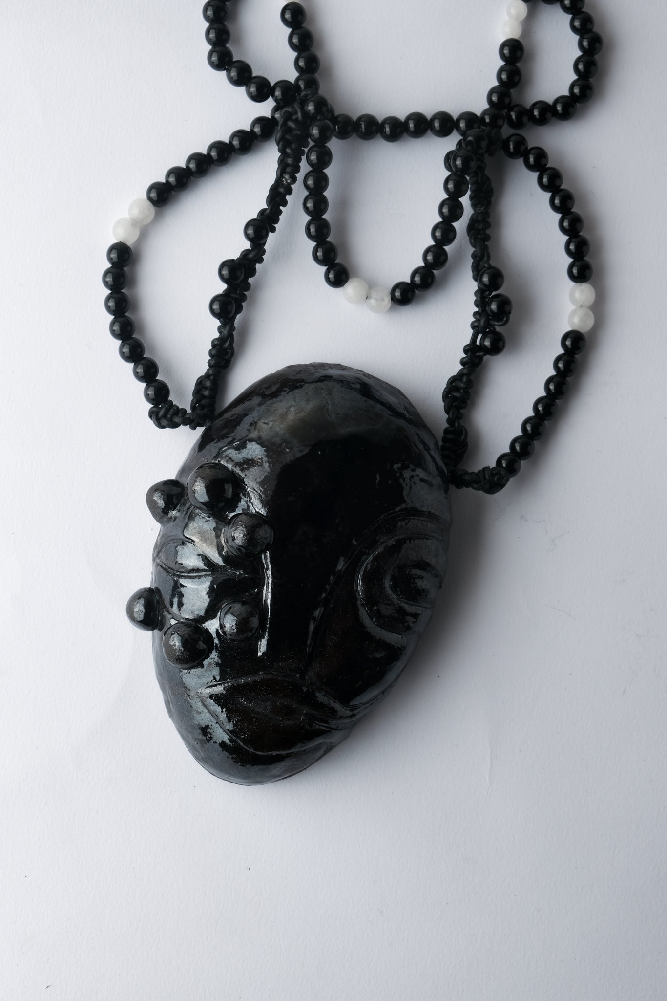 1/1 – XL Ceramic KHIRY Mask Pendant on Onyx and Quartz Beaded Cord