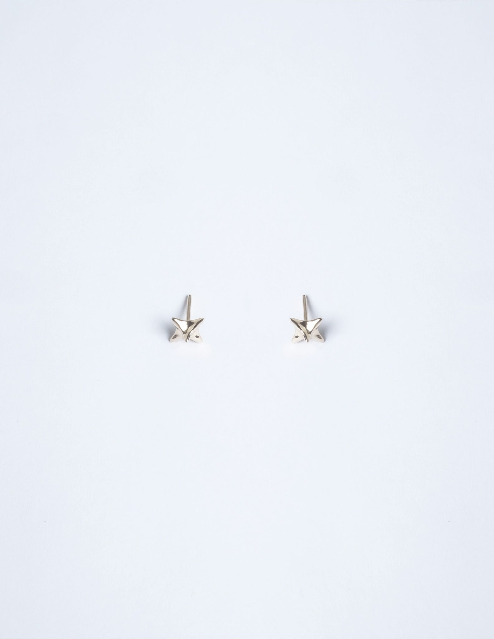 Pair of Tiny Solo Spike Studs Nude in 14K Gold