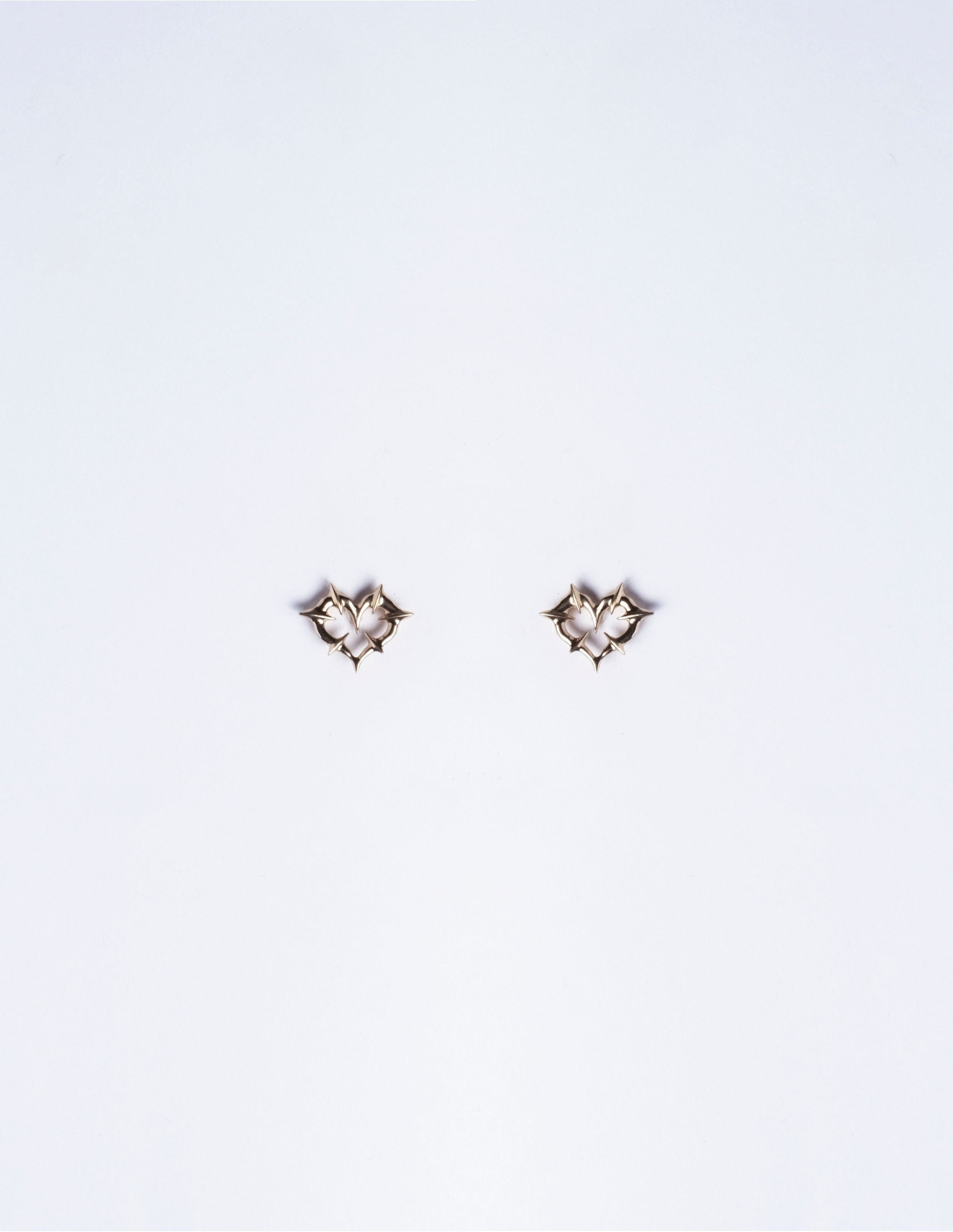 Pair of Tiny Tough Love Studs in 14K Gold