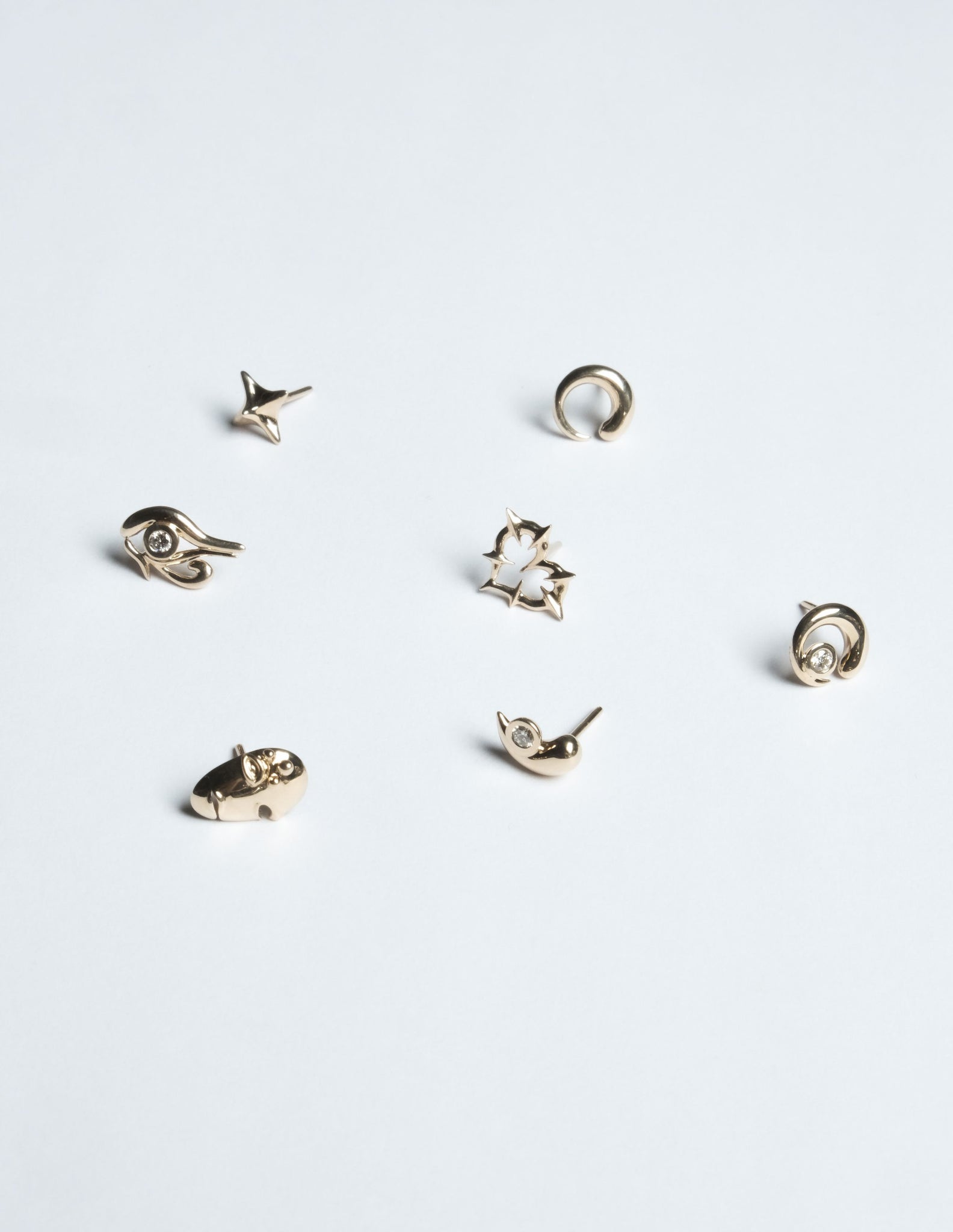 Tiny Mask Stud in 14K Gold